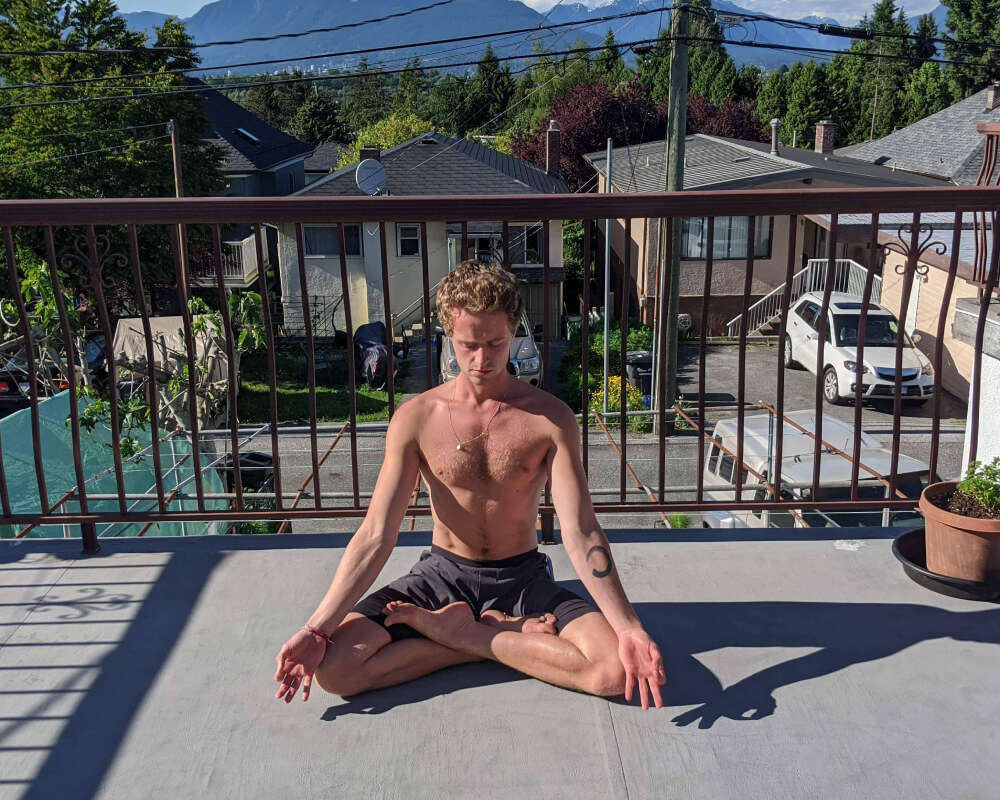 Yoga Mapp teacher Connor Roff in Padmasana pose