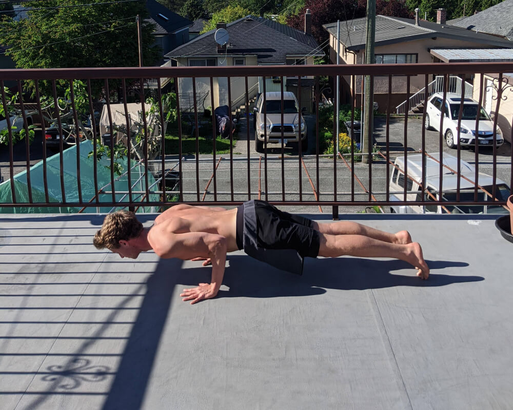 Yoga Mapp teacher Connor Roff in chaturanga dandasana pose