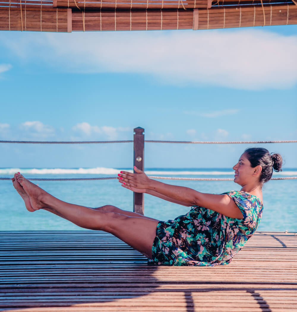 Yoga Mapp founder and yoga teacher Shruti Srivastava in boat pose